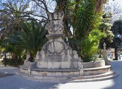 Bench with emblem in the Gardens of Glorieta in Valencia