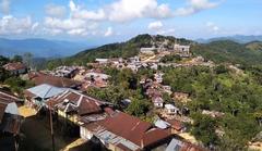 panoramic view of Senvawn Village in the daytime showing houses and surrounding hills