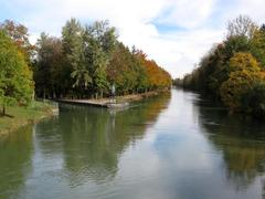 Fork of the Raft Canal from the Isar Canal with a monument near Hinterbrühler See in Munich