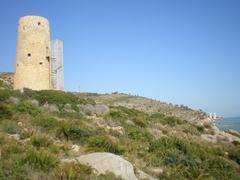 Scenic coastal view of Oropesa del Mar with clear blue sea and rocky shoreline