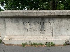 Inscription on Sully Bridge in Paris