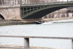 Police boat at Notre-Dame Bridge in Paris