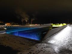 Inderhavnsbroen in Copenhagen at night with snow