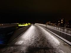 Inderhavnsbroen bridge at night with snow in Copenhagen