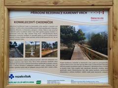 Information board at wooden sidewalk in Kamenný vrch nature reserve, Brno-Nový Lískovec, South Moravian Region, Czechia