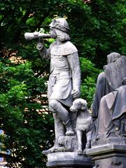 Kranner's Fountain statue with a man and a dog in Prague's Old Town