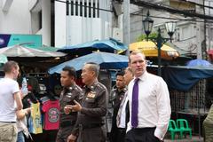 Foreign Office Minister Jeremy Browne with Pol Col. King Kwaengvisadchaichan in Khao San Road, Thailand