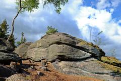 Moučné Pytle Nature Monument with rocky landscape and lush greenery