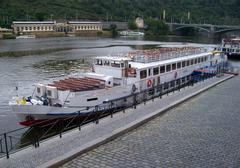 Boat Cecílie docked at Dvořákovo nábřeží in Old Town, Prague