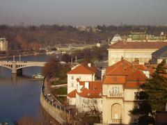 Charles Bridge over Vltava River in Prague at dusk in November 2006