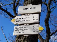 A hiking fingerpost on Hradiště Hill in Dolní Břežany-Lhota