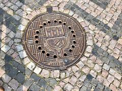 Manhole cover in Staré Zámecké Schody, Hradčany, Prague