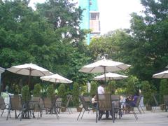 Hong Kong Heritage Discovery Centre at Kowloon Park with umbrellas on a Saturday