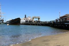 Hyde Street Pier in San Francisco with boats and historic buildings