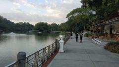 Lake Gardens in Kuala Lumpur with lush greenery and a serene lake