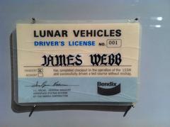 honorary lunar vehicles driver's license presented to NASA head James Webb