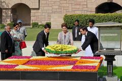 President Dilma Rousseff deposits a flower arrangement at the Memorial of Mahatma Gandhi in New Delhi