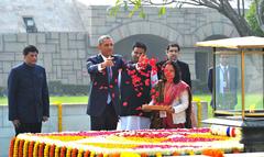 Barack Obama paying floral tributes at Mahatma Gandhi's Samadhi at Rajghat in Delhi