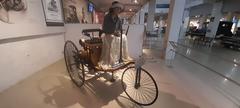 Interior of the Gedee Car Museum featuring classic cars