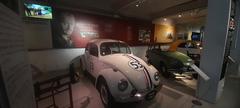 Interior of the Gedee Car Museum showcasing vintage cars