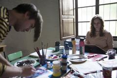 Artists working in the workshop of the Museum Jorge Rando