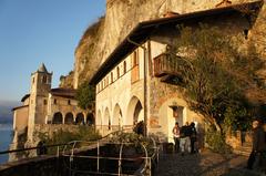 Santa Caterina del Sasso monastery perched on a cliff overlooking Lake Maggiore