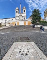 Trinità dei Monti church illuminated at night in Rome