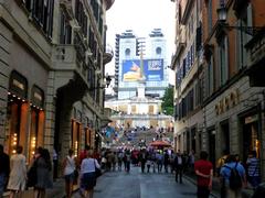 View of Via dei Condotti leading to Piazza di Spagna and Santa Trinità dei Monti in Rome