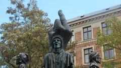 Man showing a middle finger to a Q-Park sign