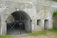 historic fort entrance with heavy gate and guard room