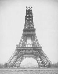 The Eiffel Tower under construction in 1888 viewed from a low angle