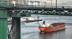 Cape Brazil ship passes Lions Gate Bridge in Vancouver harbour