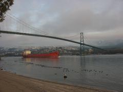 Freighter passing under the Lion's Gate Bridge in Vancouver