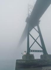 Lion's Gate Bridge shrouded in fog