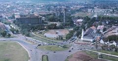 View from Monas toward Istiqlal Mosque under construction, Jakarta Cathedral, and Lapangan Banteng