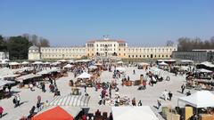 Entrance of Villa Contarini with antique market on the square in Piazzola sul Brenta