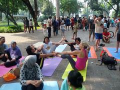 outdoor yoga class in Taman Suropati, Jakarta