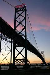 Ambassador Bridge at dusk from Windsor, Canada