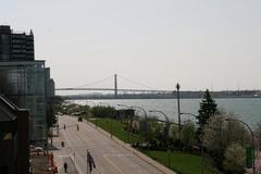 Ambassador Bridge at dusk with city skyline in the background