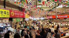 Gwangjang Market in Seoul bustling with people and vendor stalls