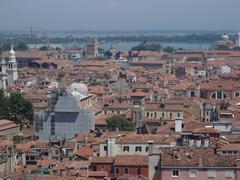 Scenic view of Venice canal with boats and historic buildings