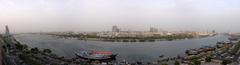 Dubai Creek with traditional boats and modern buildings