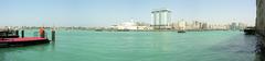 View of Dubai Creek with boats and buildings