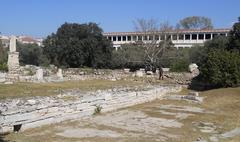 view of the ancient Agora in Athens with ruins and green landscape