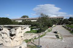 back side of the ruins of the Odeon of Agrippa in Ancient Agora of Athens with Stoa of Attalus in the background