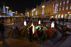 Advent celebration in Zagreb with people gathered in a festive, illuminated square