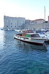 Old Port Dubrovnik with boats and St. John fortress