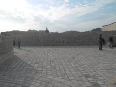 Panoramic view of Dubrovnik with its historic stone buildings and red-tiled roofs