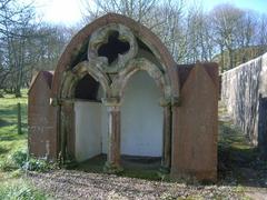 13th Century Ecclesiastical stonework folly in Oatfield House gardens