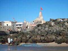 Dwaraka beach with Dwarakadheesh Temple in the background